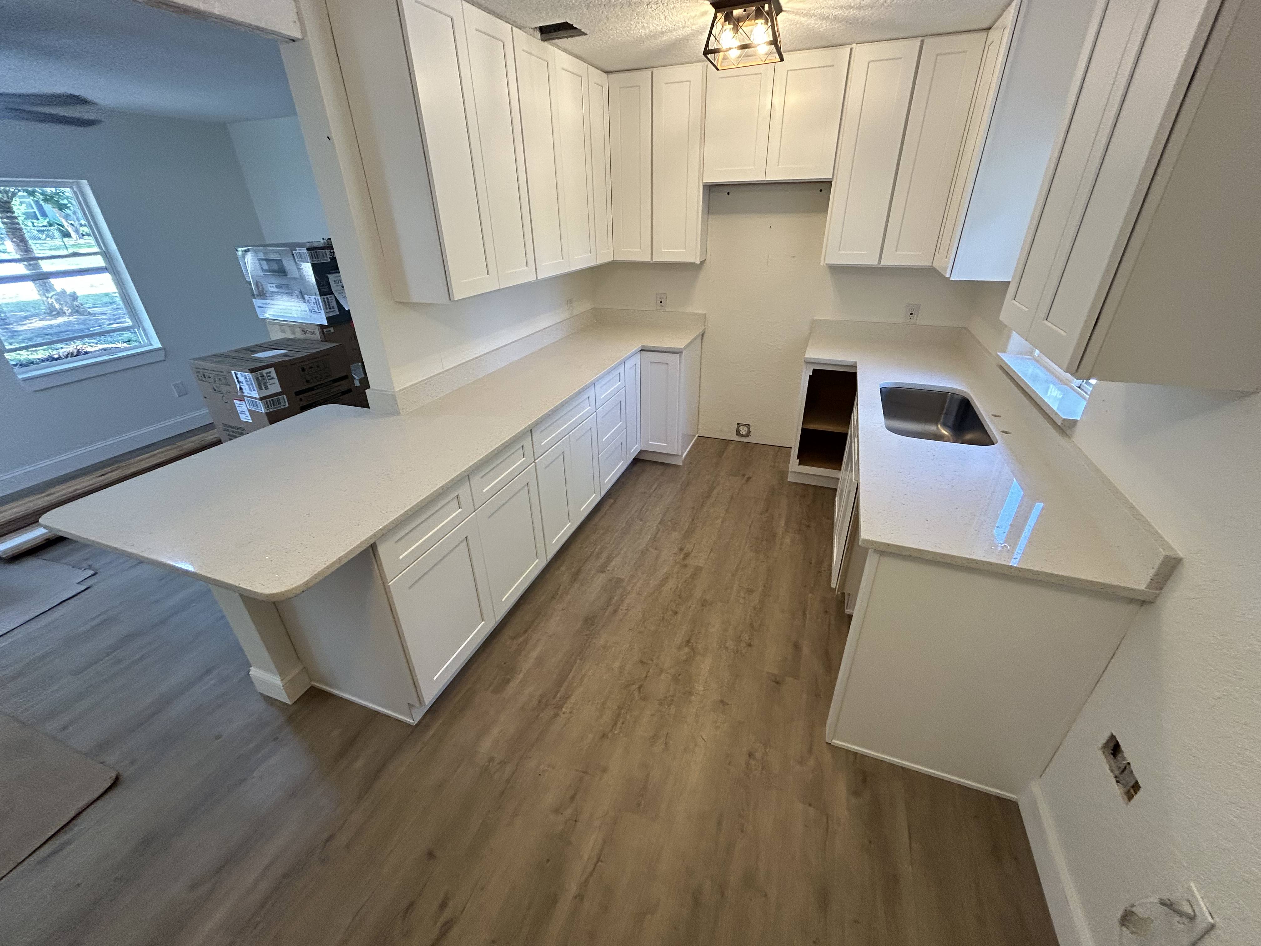 Newly installed countertops and cabinets
