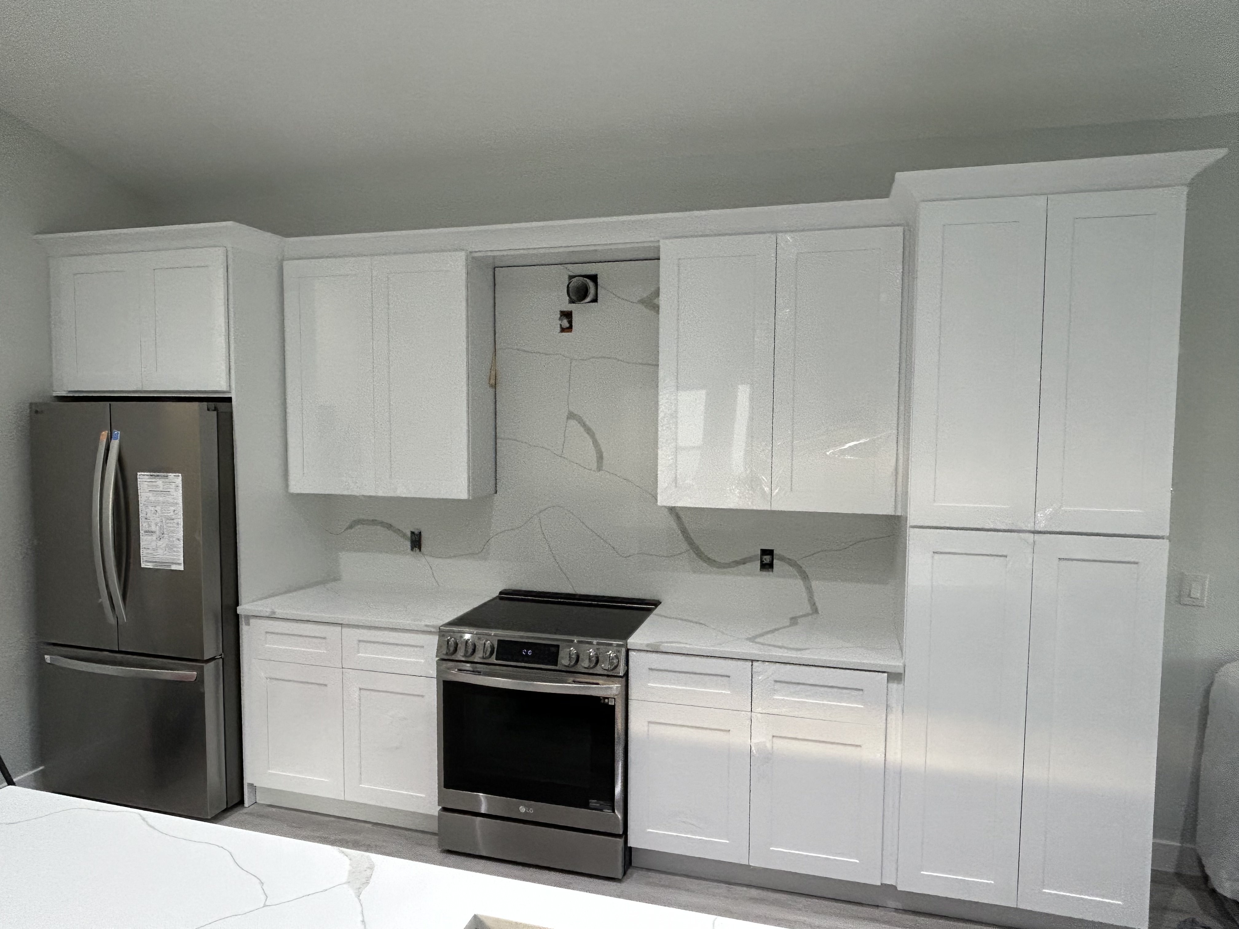 Contemporary kitchen with stainless appliances